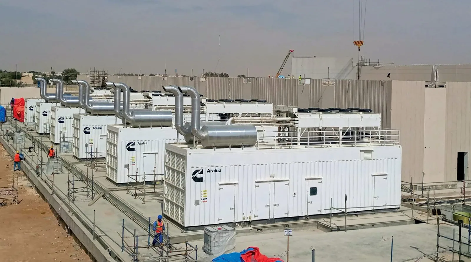 Row of Cummins standby generator sets at a job site — Miami, FL