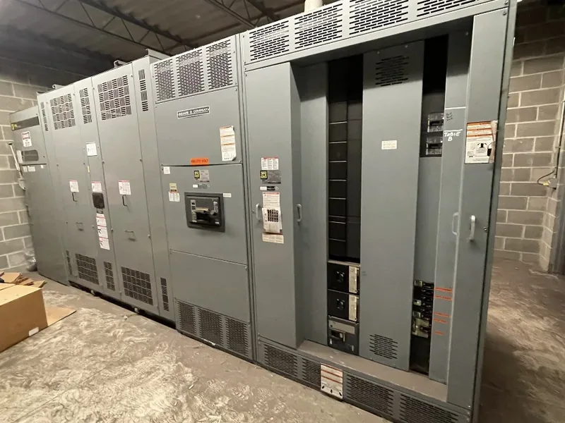 Medium-voltage switchgear line-up staged in a warehouse — Miami, FL